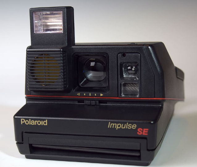 A black Polaroid camera
